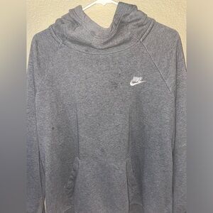 grey nike hoodie, size XL but fits like a medium and large!